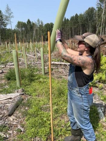 Caroline protecting newly planted trees